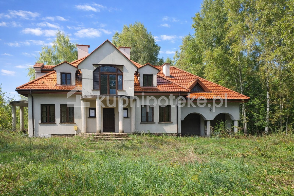 Dom jednorodzinny z podjazdem i garażem Wola Drzewiecka, sprzedaż wierzytelności hipotecznej