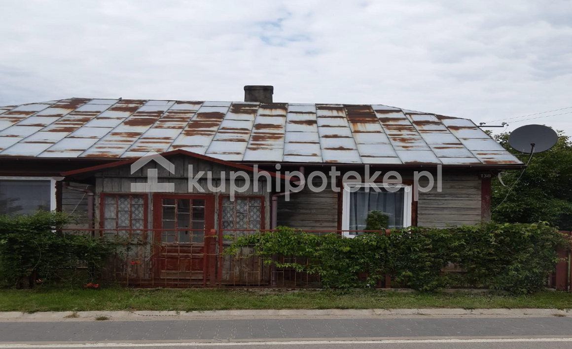 Dom w Parczowie na ogrodzonej działce - sprzedaż wierzytelności