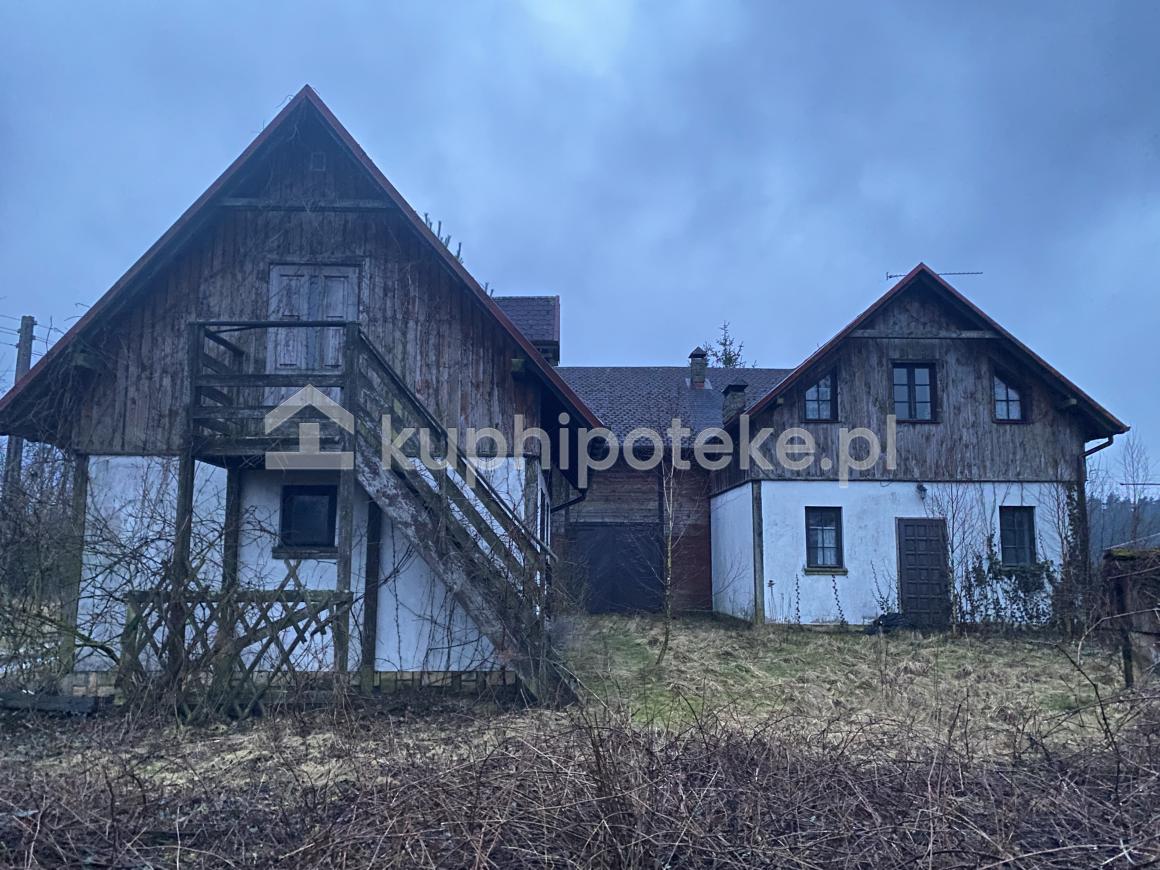 Pensjonat na działkach rekreacyjnych widok z tyłu budynku, Wierzchownia gmina Górzno, sprzedaż wierzytelności hipotecznej