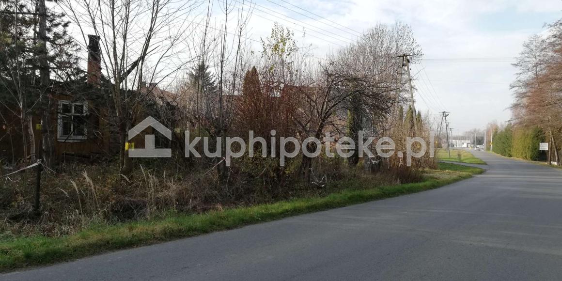 Grunt przy drodze asfaltowej w Biadolinach Szlacheckich - wierzytelność