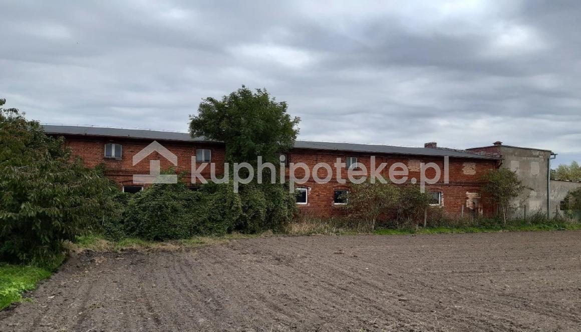 Duża działka zabudowana trzema budynkami, Sławsko Dolne - sprzedaż wierzytelności zabezpieczonej.